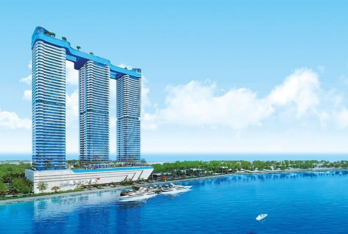 Exterior view of Oceanz by Danube apartments in Dubai Maritime City featuring luxury seafront architecture.