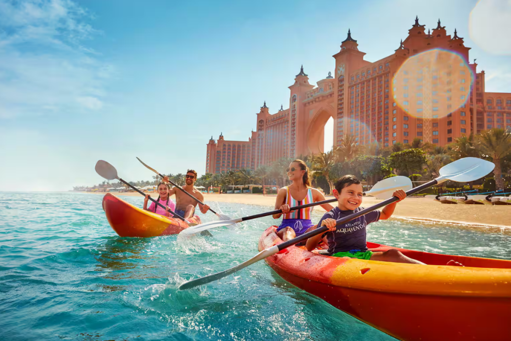 A vibrant summer day in Dubai, featuring the city’s modern skyline under clear blue skies and warm temperatures.