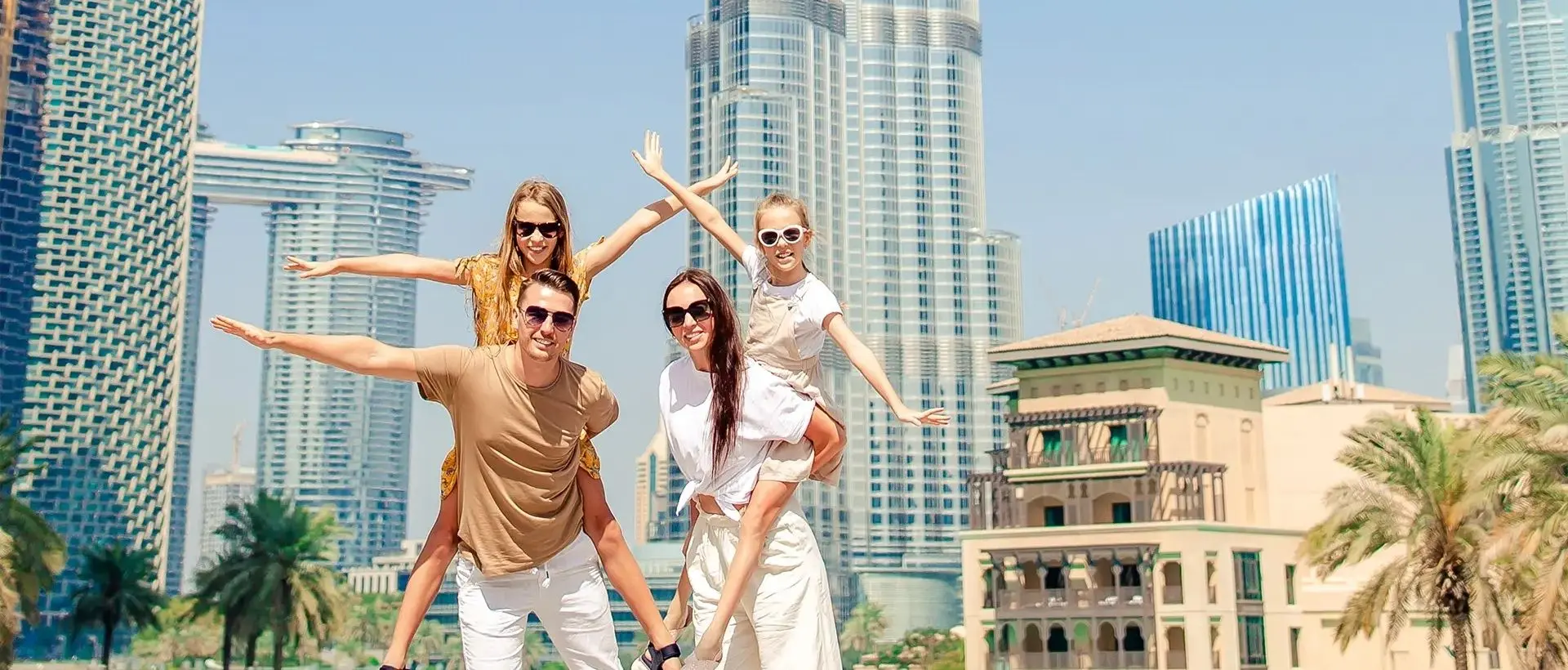 A family enjoying life in dubai thanks to the uae golden visa that allows longterm residence and access to education.
