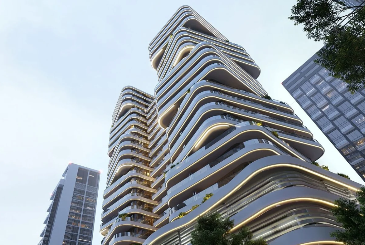 Exterior view of DG1 Tower in Business Bay showing its sculptural architecture along the Dubai Water Canal