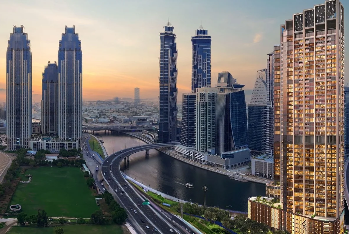 Exterior view of One River Point Business Bay positioned along the Dubai Water Canal