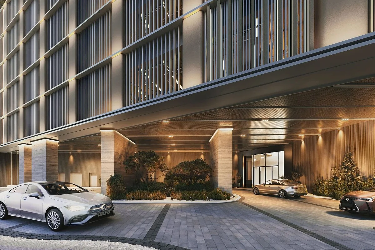 Exterior view of One River Point Business Bay positioned along the Dubai Water Canal