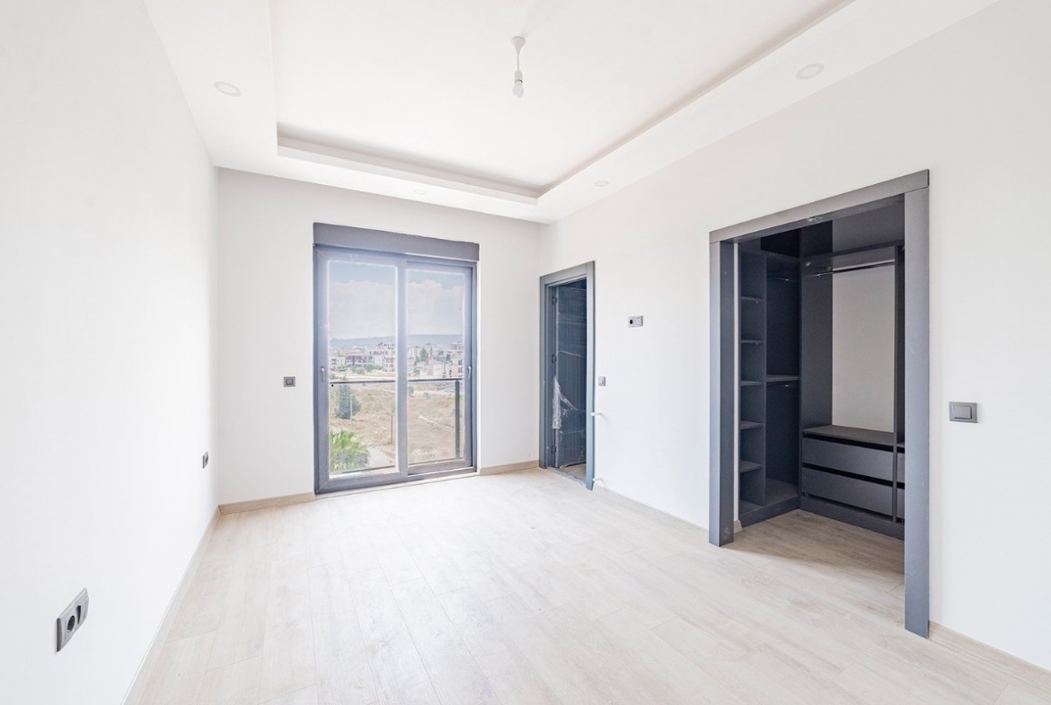 family apartments for sale in Antalya Kepez near tram with swimming pool parking playground and spacious interiors