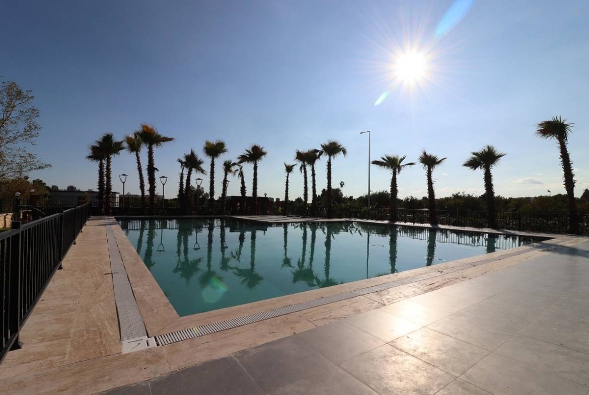 apartments for sale in Mersin Çeşmeli near the sea with communal pool and ready to move