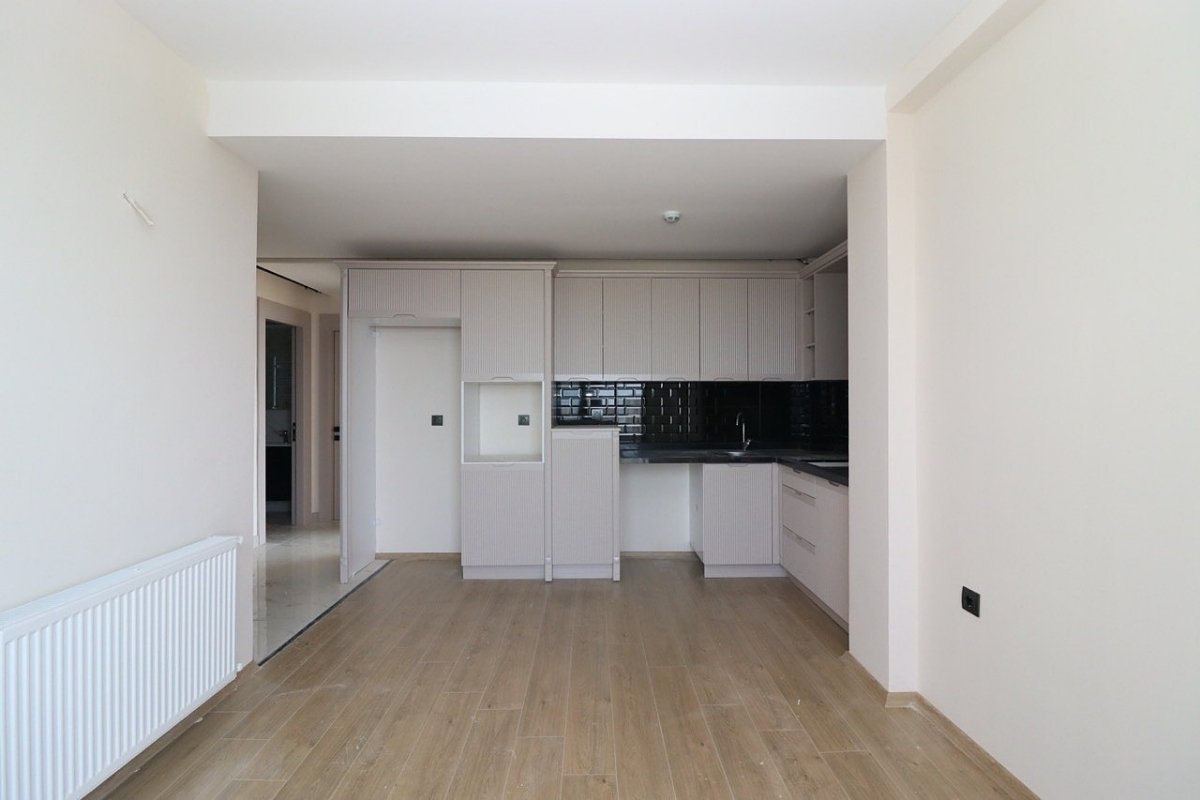 sea view apartments for sale in Mersin Mezitli near the beach with communal pool and ready to move interiors