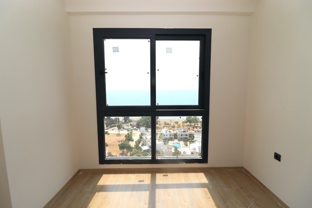 sea view apartments for sale in Mersin Mezitli near the beach with communal pool and ready to move interiors