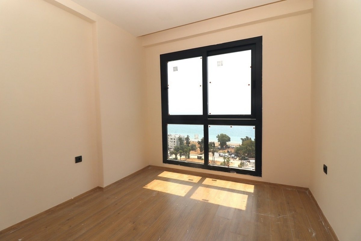 sea view apartments for sale in Mersin Mezitli near the beach with communal pool and ready to move interiors