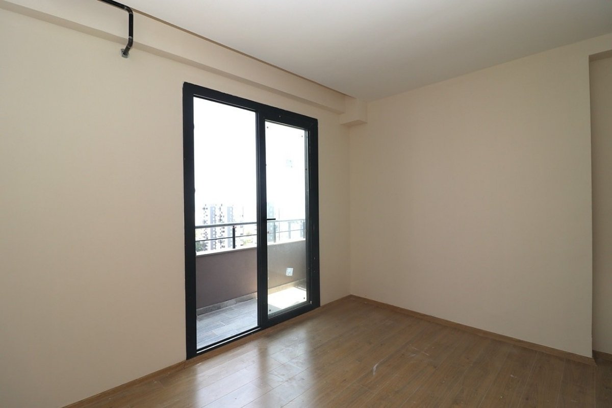 sea view apartments for sale in Mersin Mezitli near the beach with communal pool and ready to move interiors