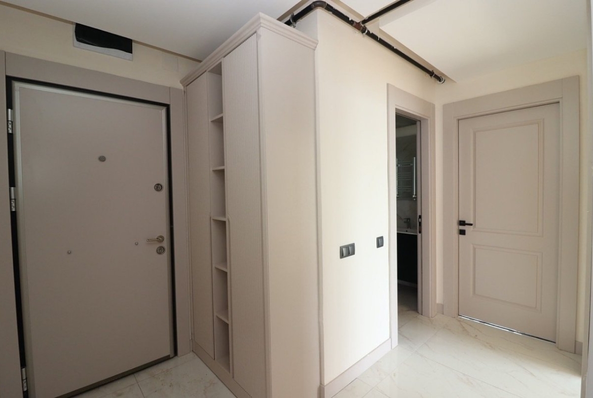 sea view apartments for sale in Mersin Mezitli near the beach with communal pool and ready to move interiors