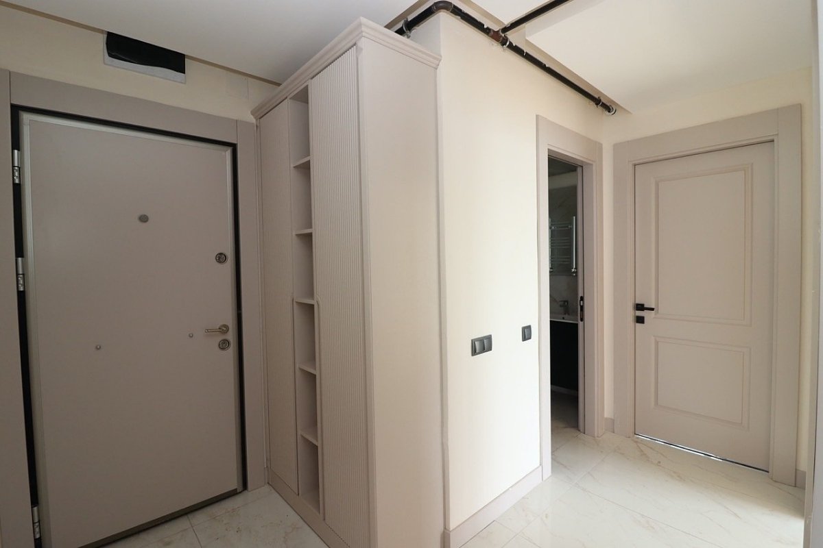 sea view apartments for sale in Mersin Mezitli near the beach with communal pool and ready to move interiors