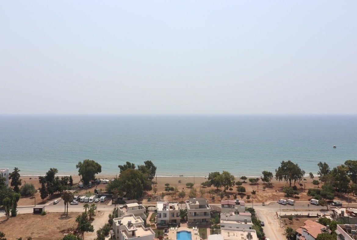 sea view apartments for sale in Mersin Mezitli near the beach with communal pool and ready to move interiors