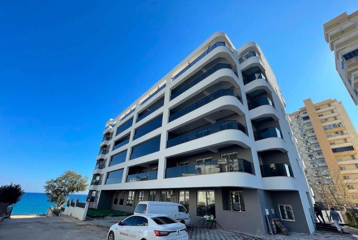Seafront apartments in Mersin with private pier, sea views and communal pool