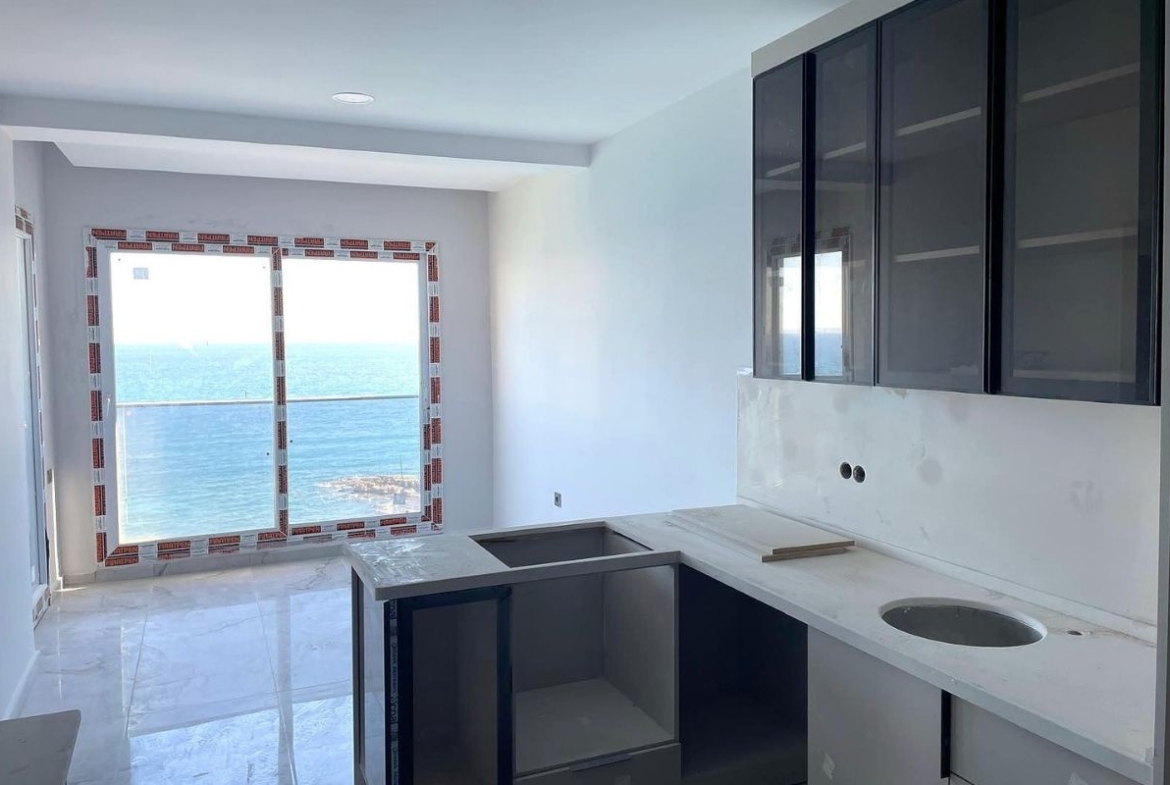 Seafront apartments in Mersin with private pier, sea views and communal pool