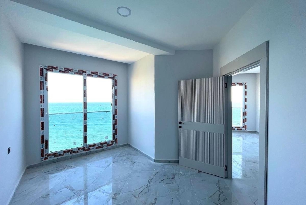 Seafront apartments in Mersin with private pier, sea views and communal pool