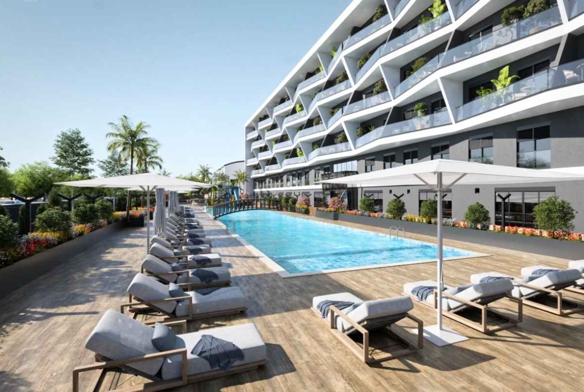 Antalya Kepez’de yüzme havuzu, aquapark, loft konutlar, balkonlar ve peyzajlı sosyal alanlar sunan satılık daireler