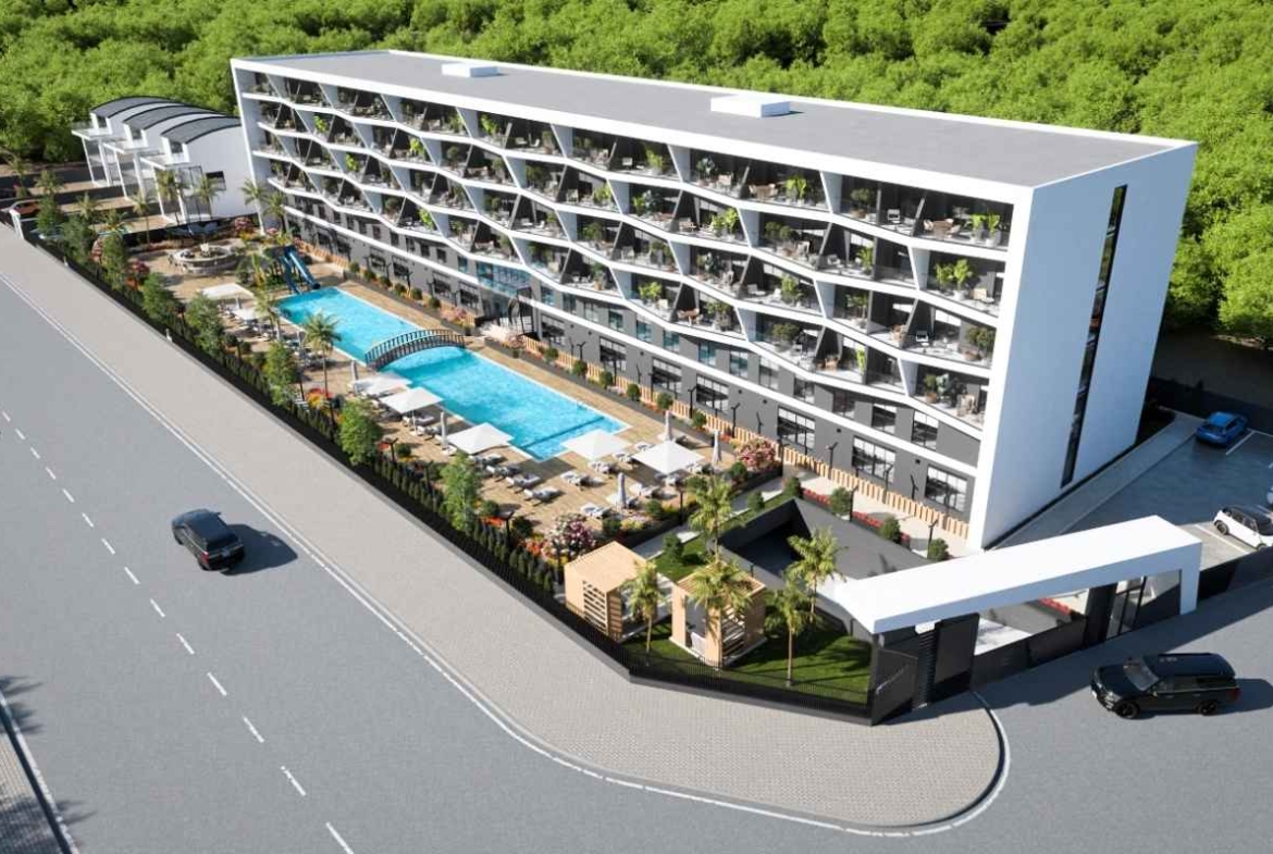 Antalya Kepez’de yüzme havuzu, aquapark, loft konutlar, balkonlar ve peyzajlı sosyal alanlar sunan satılık daireler
