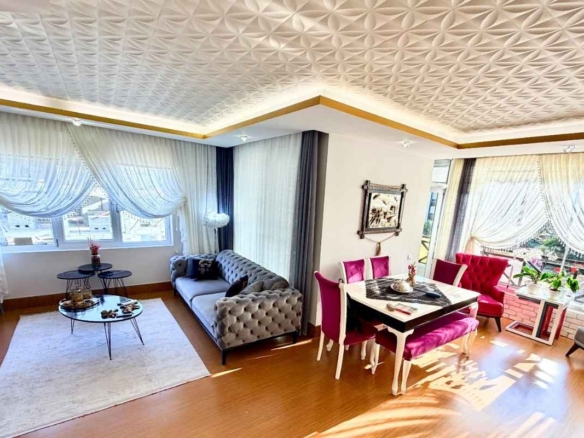 Renovated uncali duplex apartment with separate kitchen glazed balcony swimming pool and green residential grounds in konyaalti antalya